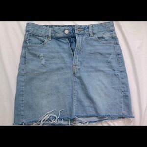 High waisted, mid wash denim skirt